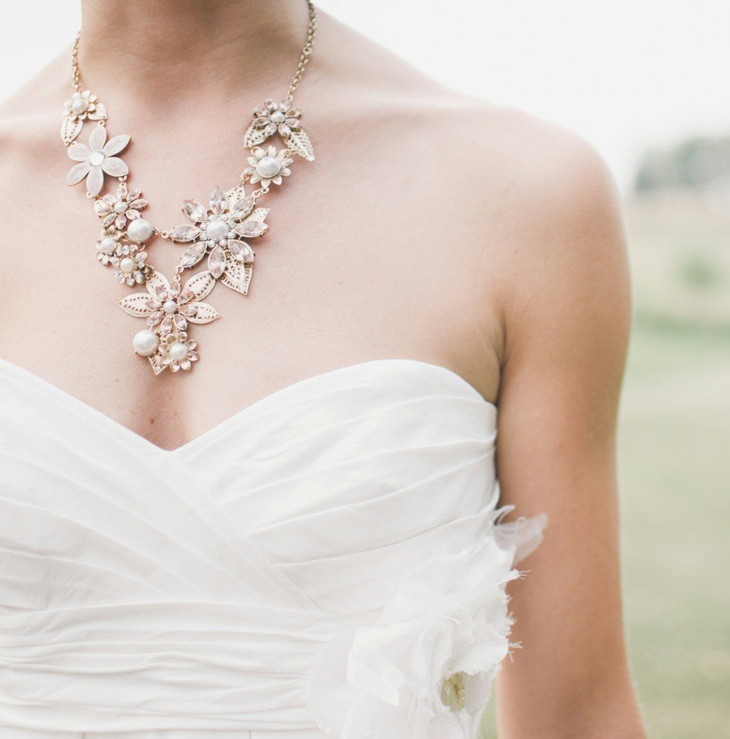 woman standing in grass field